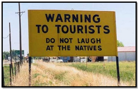 Warning to tourists - ceļa zīme